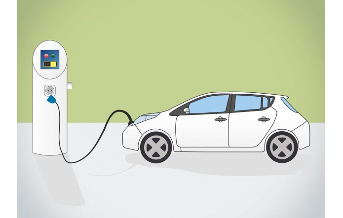 Ilustracja przedstawia nowoczesne, ekologiczne rozwiązanie transportowe. Biały samochód elektryczny jest podłączony do stacji ładowania za pomocą czarnego kabla, który prowadzi do przedniej części pojazdu. Stacja ma prosty, futurystyczny design z ekranem i kolorowymi wskaźnikami. Tło jest w odcieniach zieleni, co podkreśla proekologiczny charakter grafiki.