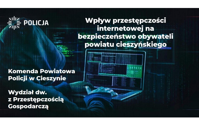 Sylwetka osoby w kapturze pracującej na laptopie, z zielonym kodem wyświetlonym na ekranie, na tle cyfrowej grafiki. Po lewej stronie logo Policji i tekst informujący o wpływie cyberprzestępczości na bezpieczeństwo mieszkańców powiatu cieszyńskiego.